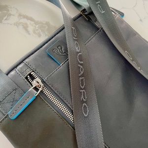PIQUADRO authentic soft grey and bright blue men's hand bag; beautiful condition